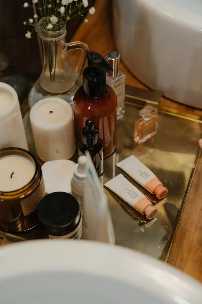 Aesthetic arrangement of skincare and beauty products on a stylish bathroom vanity.